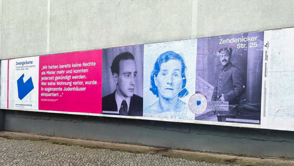 Auf einer sehr langen Werbefläche reihen sich viele Großplakate aneinander. Unterschiedliche Portraits werden gezeigt.